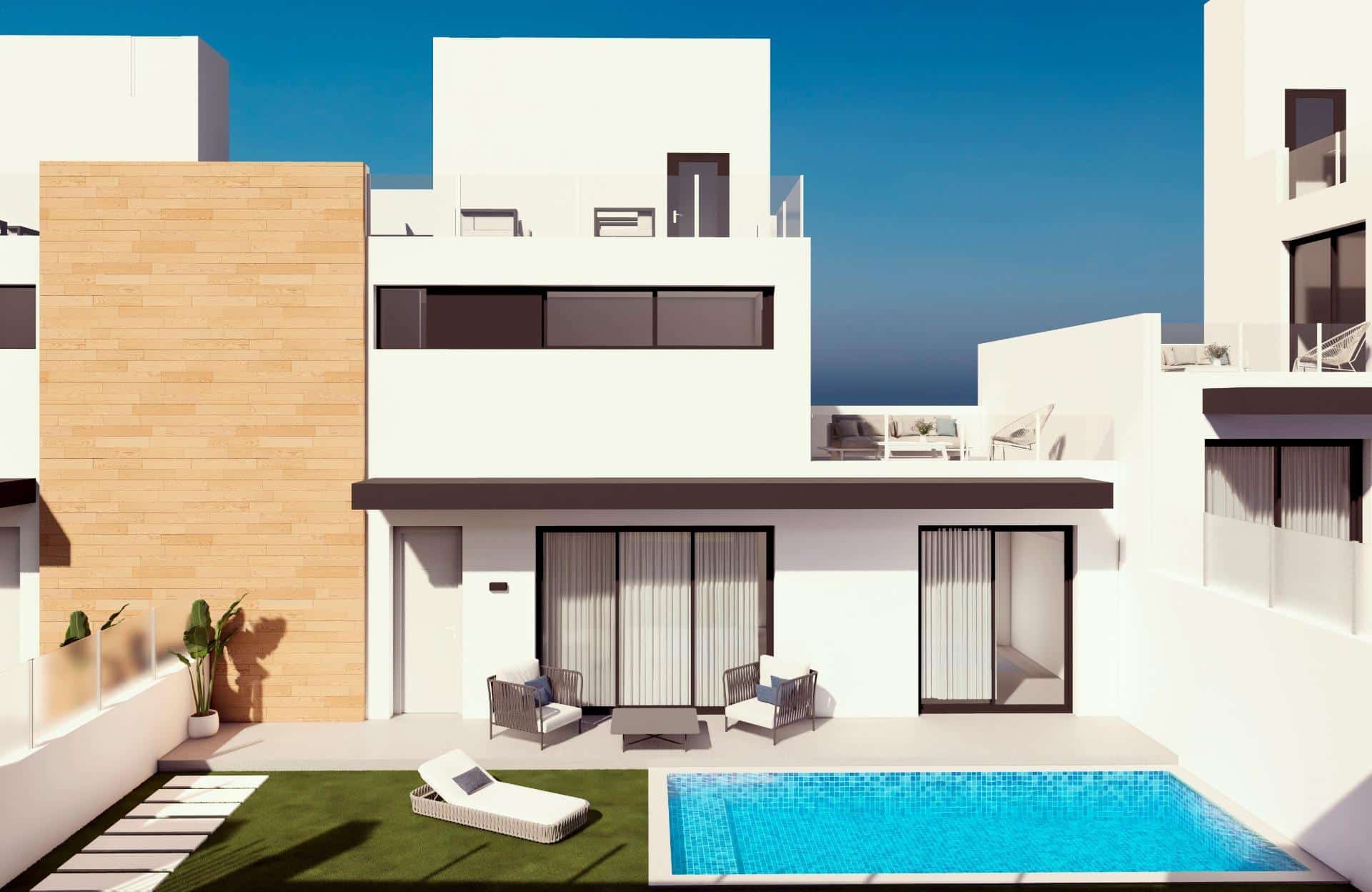 Terras, zwembad en vooraanzicht van nieuwbouw huis in Villamartin in Spanje, gelegen aan de  Costa Blanca-Zuid