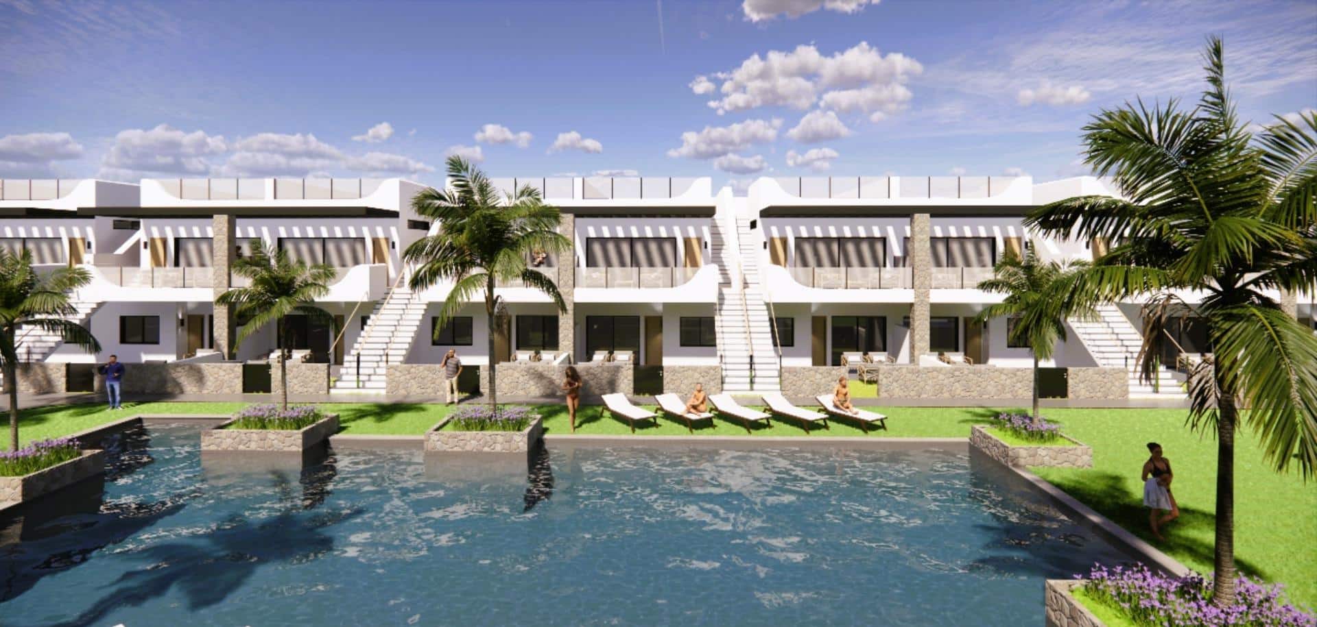 Gemeenschappelijk zwembad en vooraanzicht van nieuwbouw appartementen in Orihuela-Costa in Spanje, gelegen aan de  Costa Blanca-Zuid