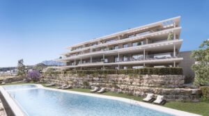 Gemeenschappelijk zwembad en vooraanzicht van in Estepona in Spanje, gelegen aan de  Costa del Sol-West