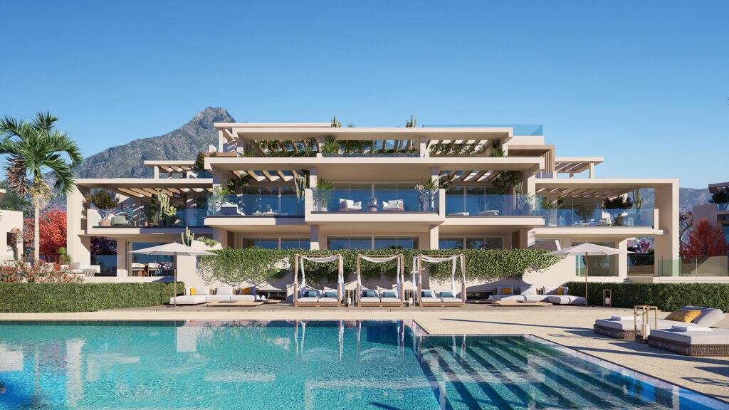 Gemeenschappelijk zwembad en vooraanzicht van nieuwbouw appartementen in Marbella in Spanje, gelegen aan de  Costa del Sol-West