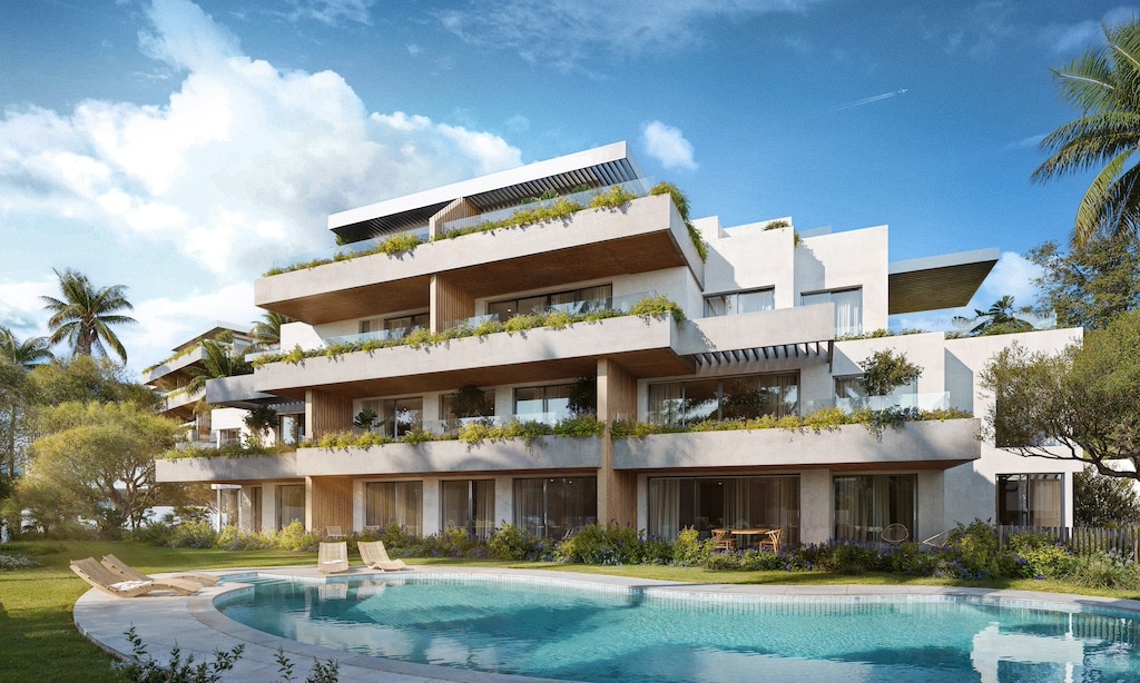 Gemeenschappelijk zwembad en vooraanzicht van in Mijas in Spanje, gelegen aan de  Costa del Sol-Centro