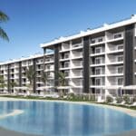Gemeenschappelijk zwembad en vooraanzicht van nieuwbouw appartement in Torrevieja in Spanje, gelegen aan de  Costa Blanca-Zuid