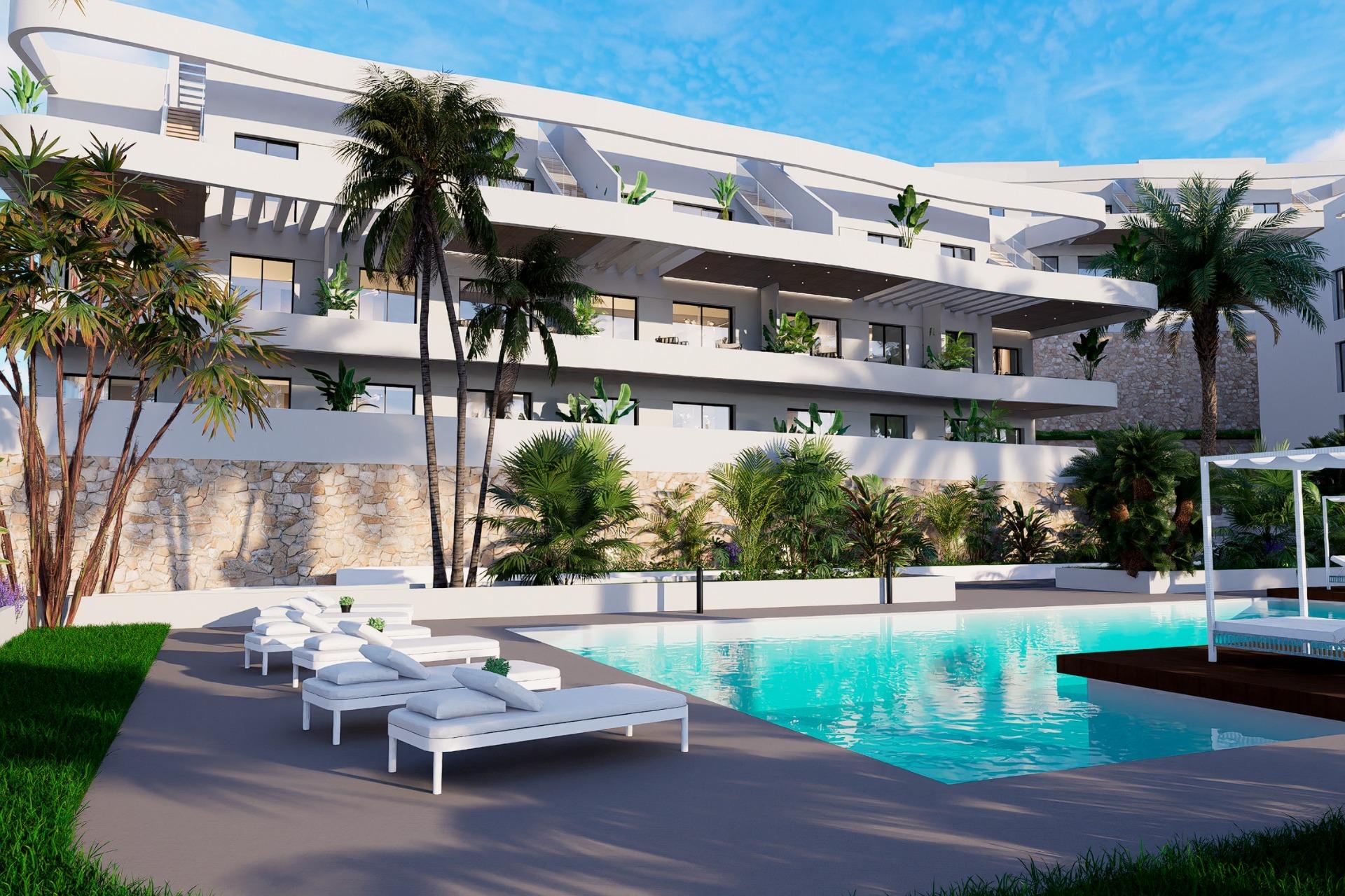 Gemeenschappelijk zwembad en vooraanzicht van nieuwbouw appartement in Finestrat in Spanje, gelegen aan de  Costa Blanca-Noord
