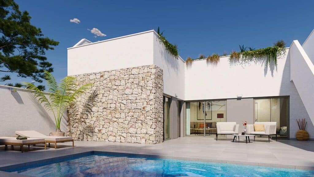 Zwembad en vooraanzicht van in Pilar De La Horadada in Spanje, gelegen aan de  Costa Blanca-Zuid