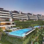 Gemeenschappelijk zwembad en vooraanzicht van nieuwbouw appartement in Benahavis in Spanje, gelegen aan de  Costa del Sol-West