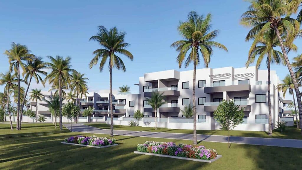 Gemeenschappelijke tuin en vooraanzicht van nieuwbouw appartement in Velez-Malaga in Spanje, gelegen aan de  Costa del Sol-Oost