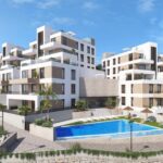 Gemeenschappelijk zwembad en vooraanzicht van nieuwbouw appartement in Vera in Spanje, gelegen aan de  Costa de Almería